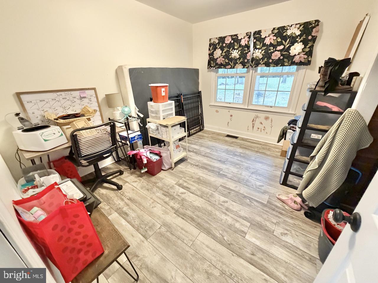 2413 Shelburn Road Millville, NJ 08332 - Photo 30 of 41 a view of a workspace with furniture and a window