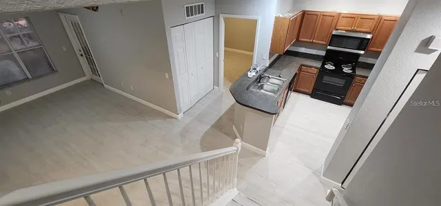 a view of stairs and living room
