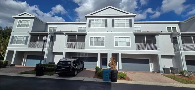 a front view of a house with yard