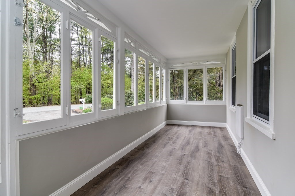 8 Everett Street Sherborn, MA 01770 - Photo 24 of 25 a view of an empty room with wooden floor and a window