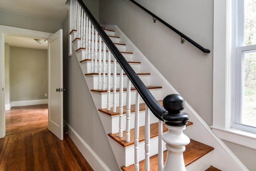 8 Everett Street Sherborn, MA 01770 - Photo 3 of 25 a view of entryway with wooden floor and stairs