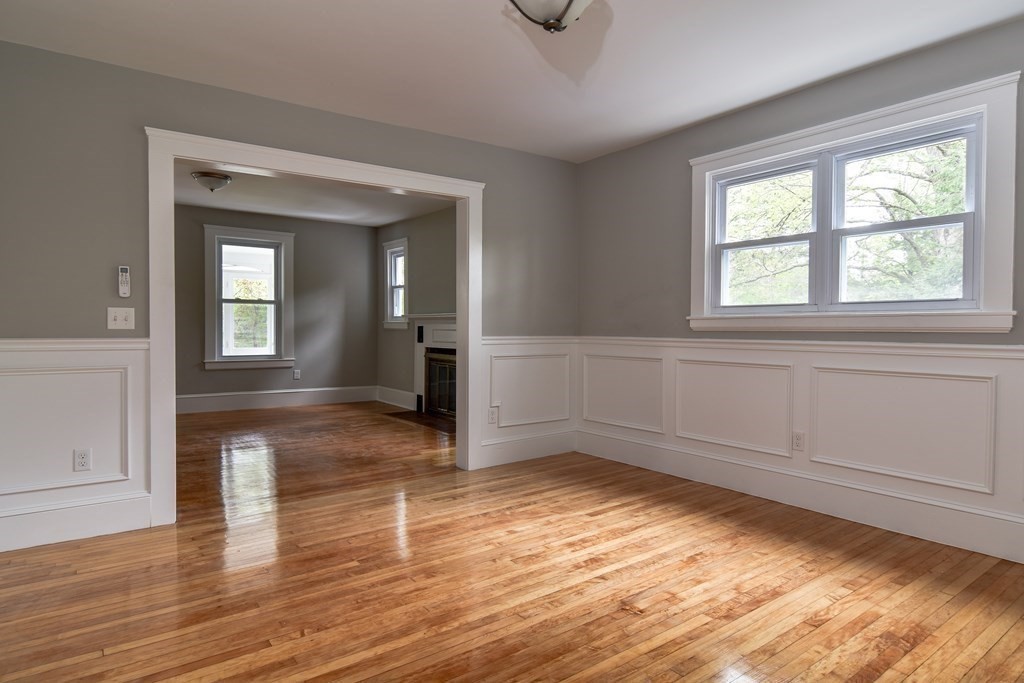 8 Everett Street Sherborn, MA 01770 - Photo 6 of 25 wooden floor in an empty room with a window