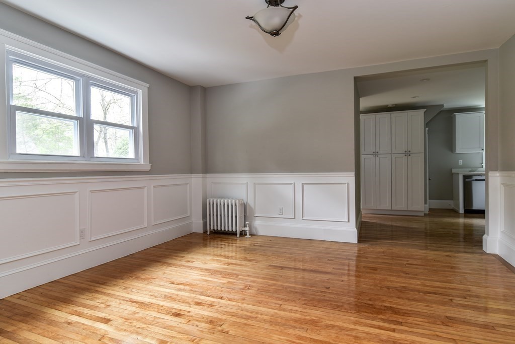 8 Everett Street Sherborn, MA 01770 - Photo 8 of 25 a view of empty room with cabinet and window