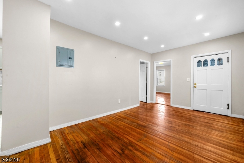 113 Second Street Elizabeth Port, NJ 07206 - Photo 18 of 32 a view of empty room with wooden floor