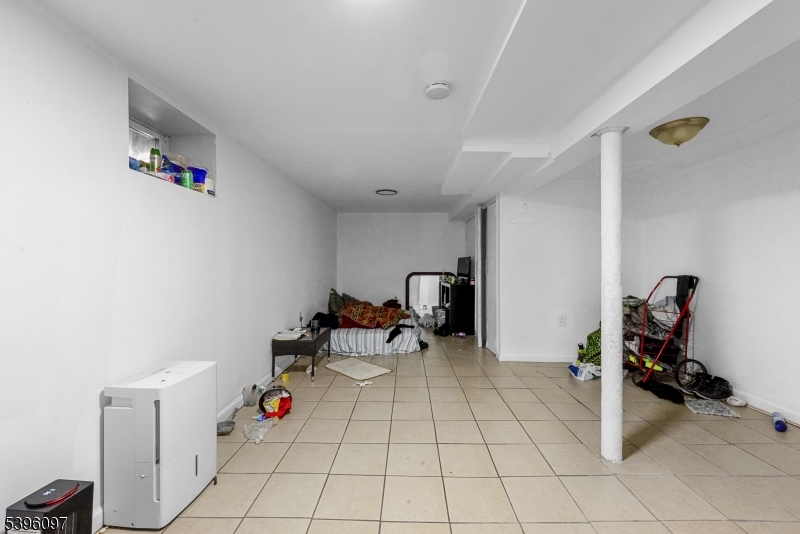 113 Second Street Elizabeth Port, NJ 07206 - Photo 2 of 34 a view of a room with gym equipment