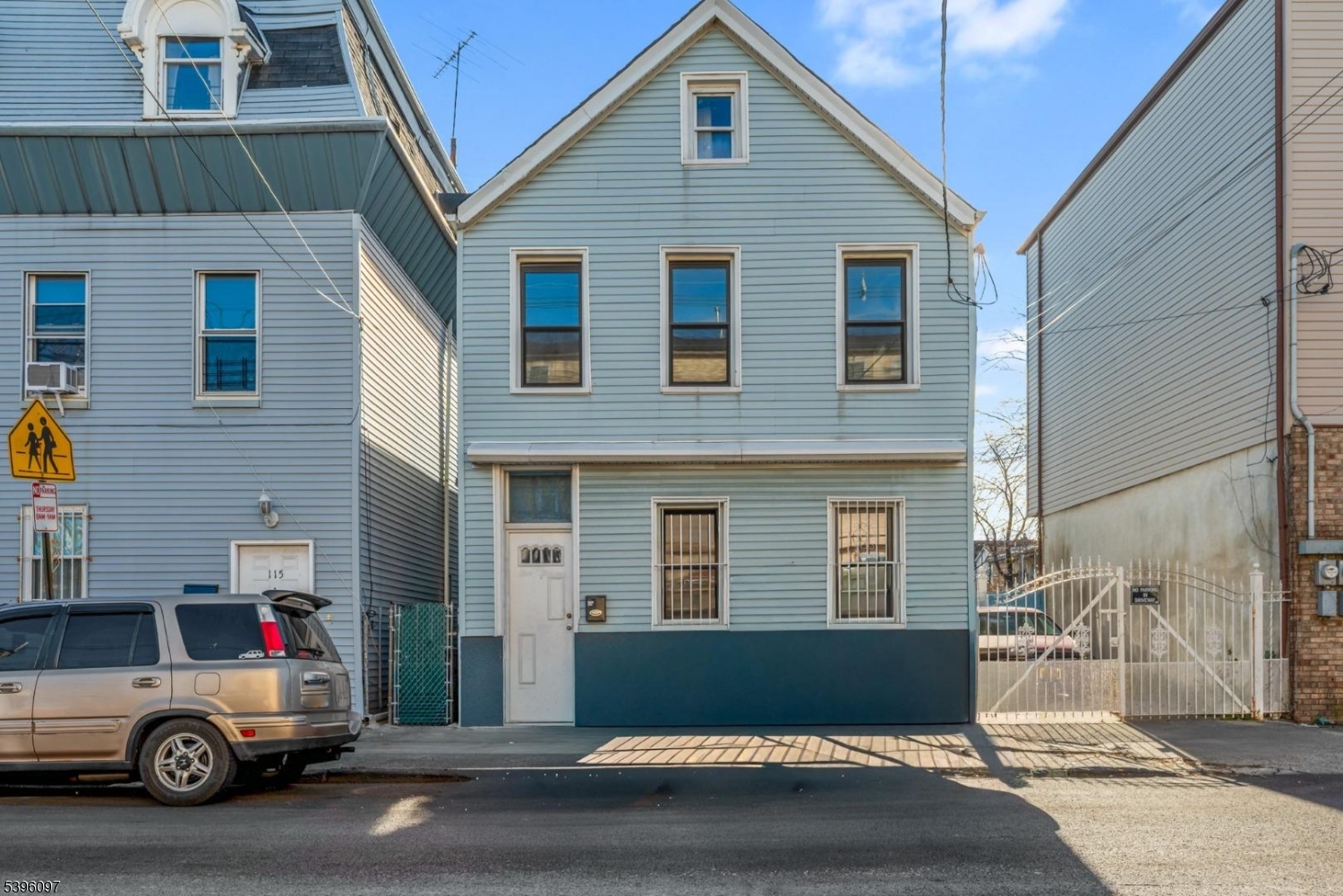 113 Second Street Elizabeth Port, NJ 07206 - Photo 23 of 34 a car parked in front of a house