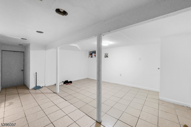 113 Second Street Elizabeth Port, NJ 07206 - Photo 5 of 34 a view of an empty room