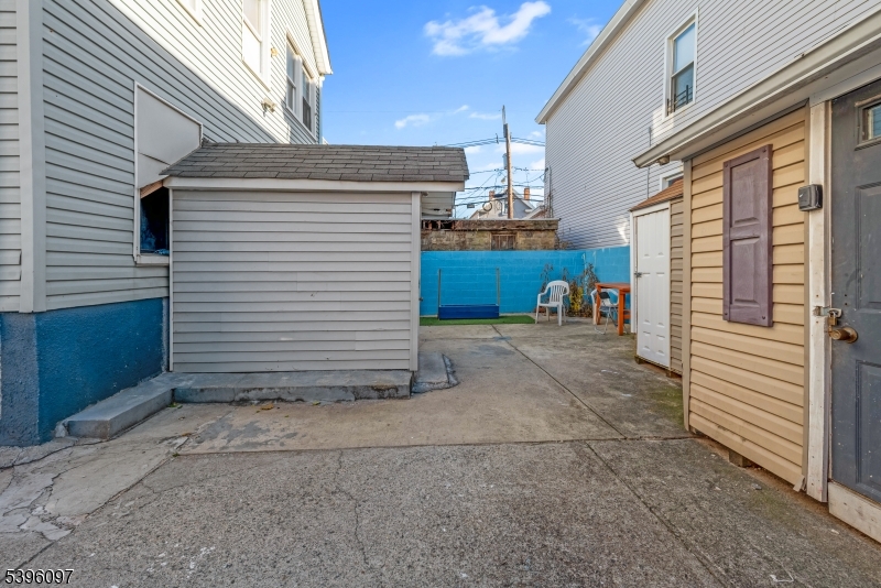 113 Second Street Elizabeth Port, NJ 07206 - Photo 6 of 32 a view of a house with a patio