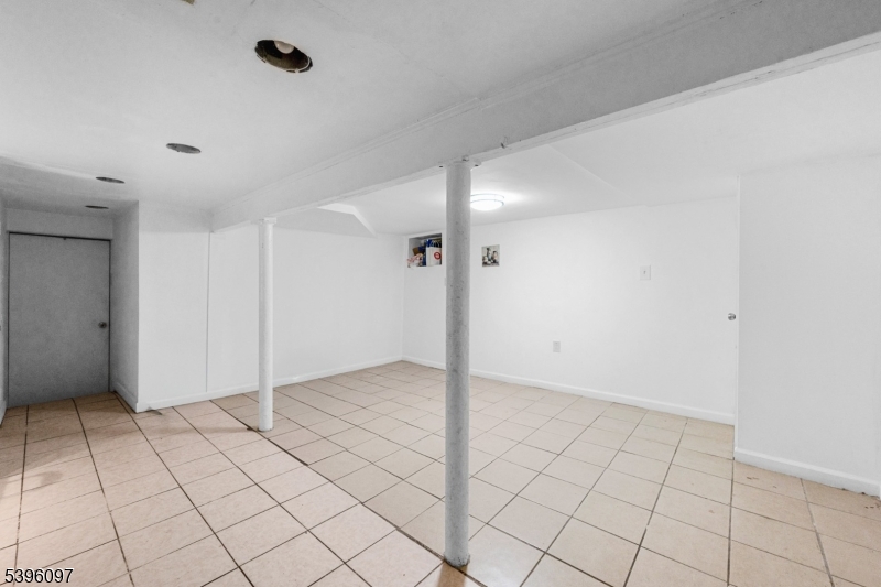 113 Second Street Elizabeth Port, NJ 07206 - Photo 6 of 34 a view of an empty room