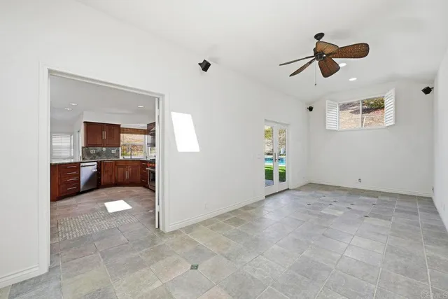 a bathroom with a granite countertop sink mirror and double
