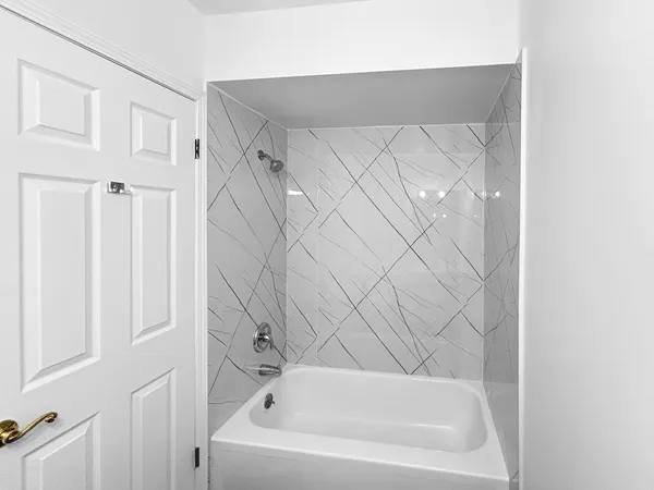 a bathroom with a bathtub
