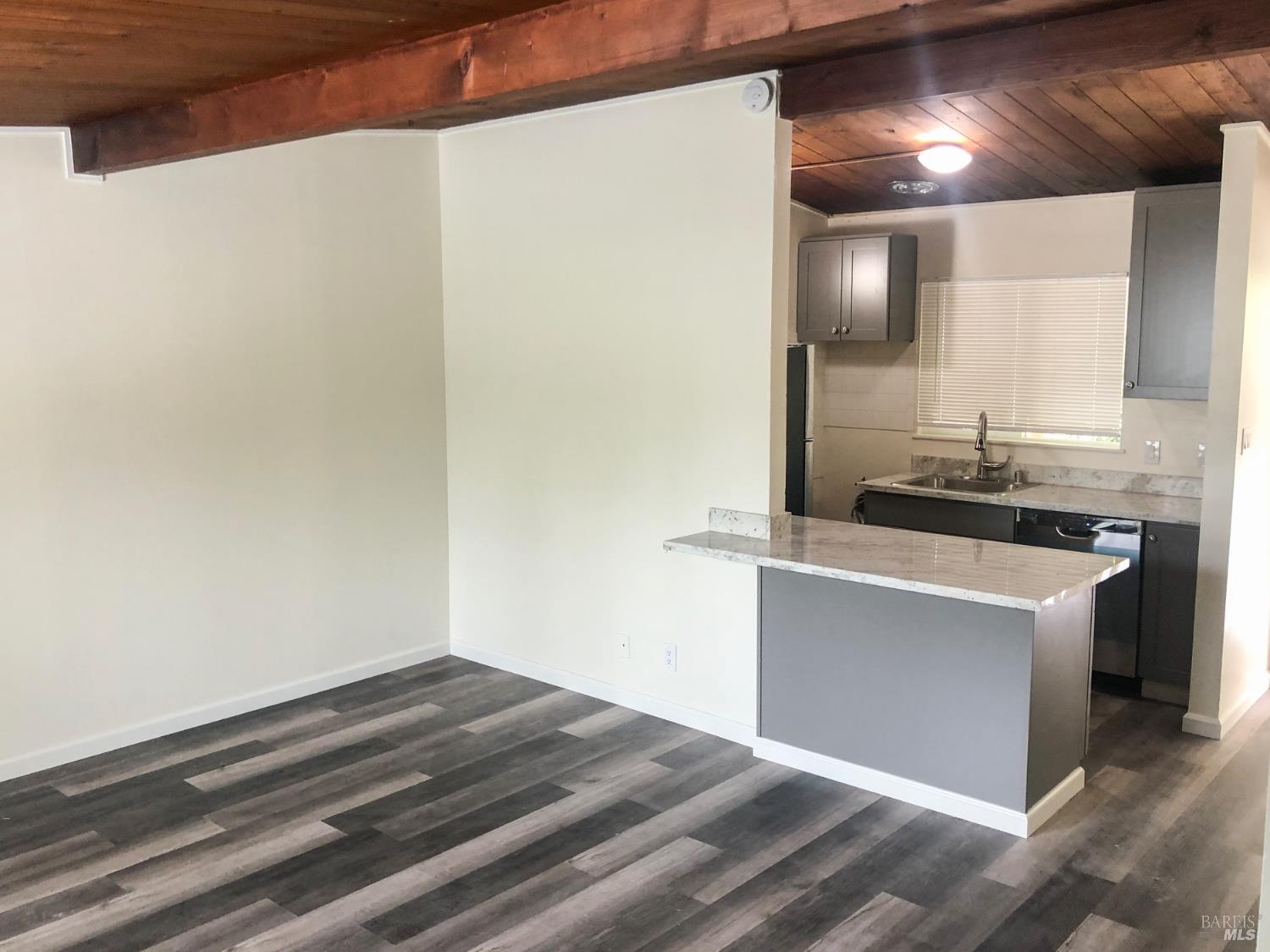 131 Kent Avenue Kentfield, CA 94904 - Photo 13 of 21 a room with a sink and cabinets