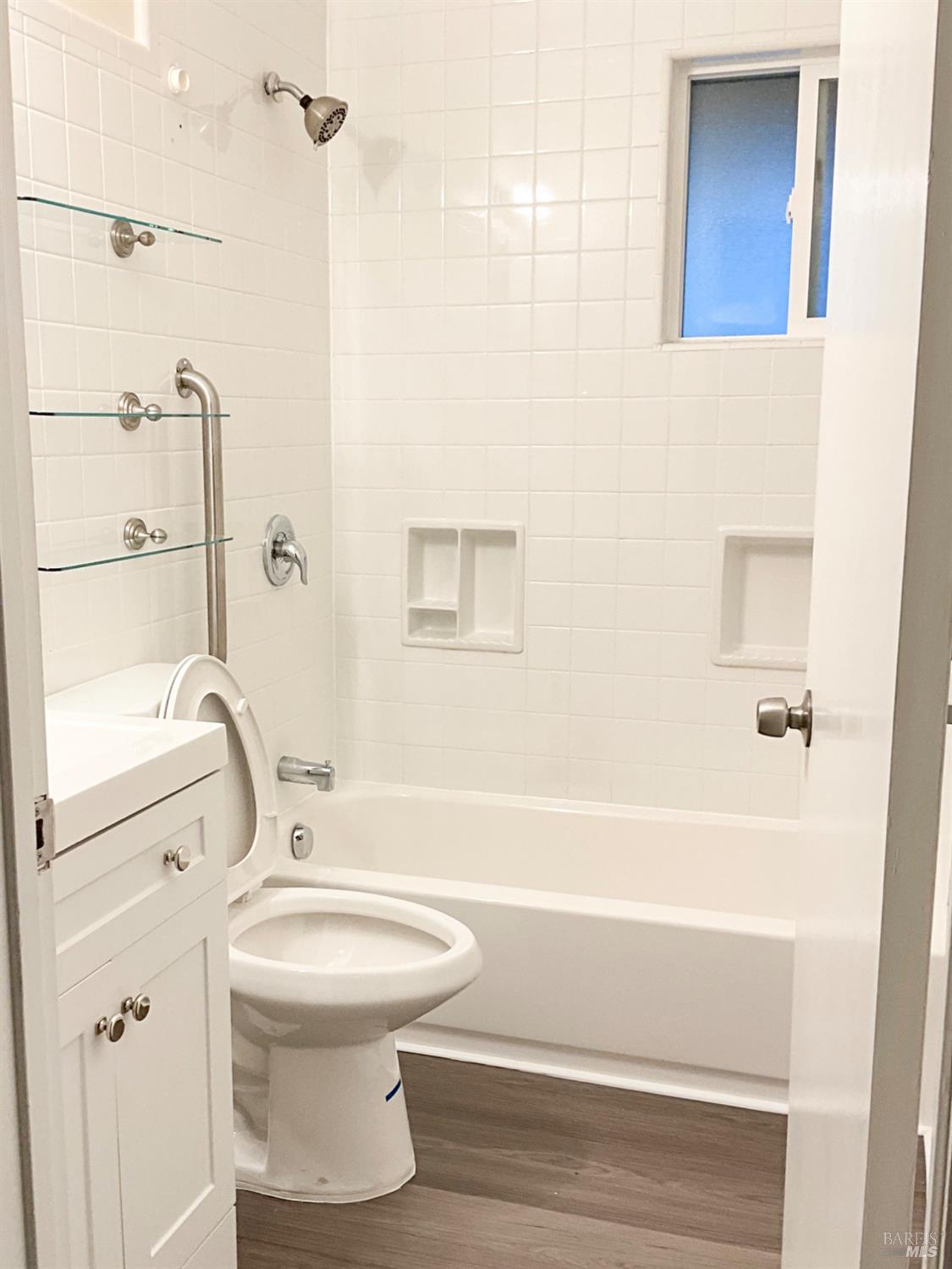 131 Kent Avenue Kentfield, CA 94904 - Photo 18 of 21 a bathroom with a toilet and a shower
