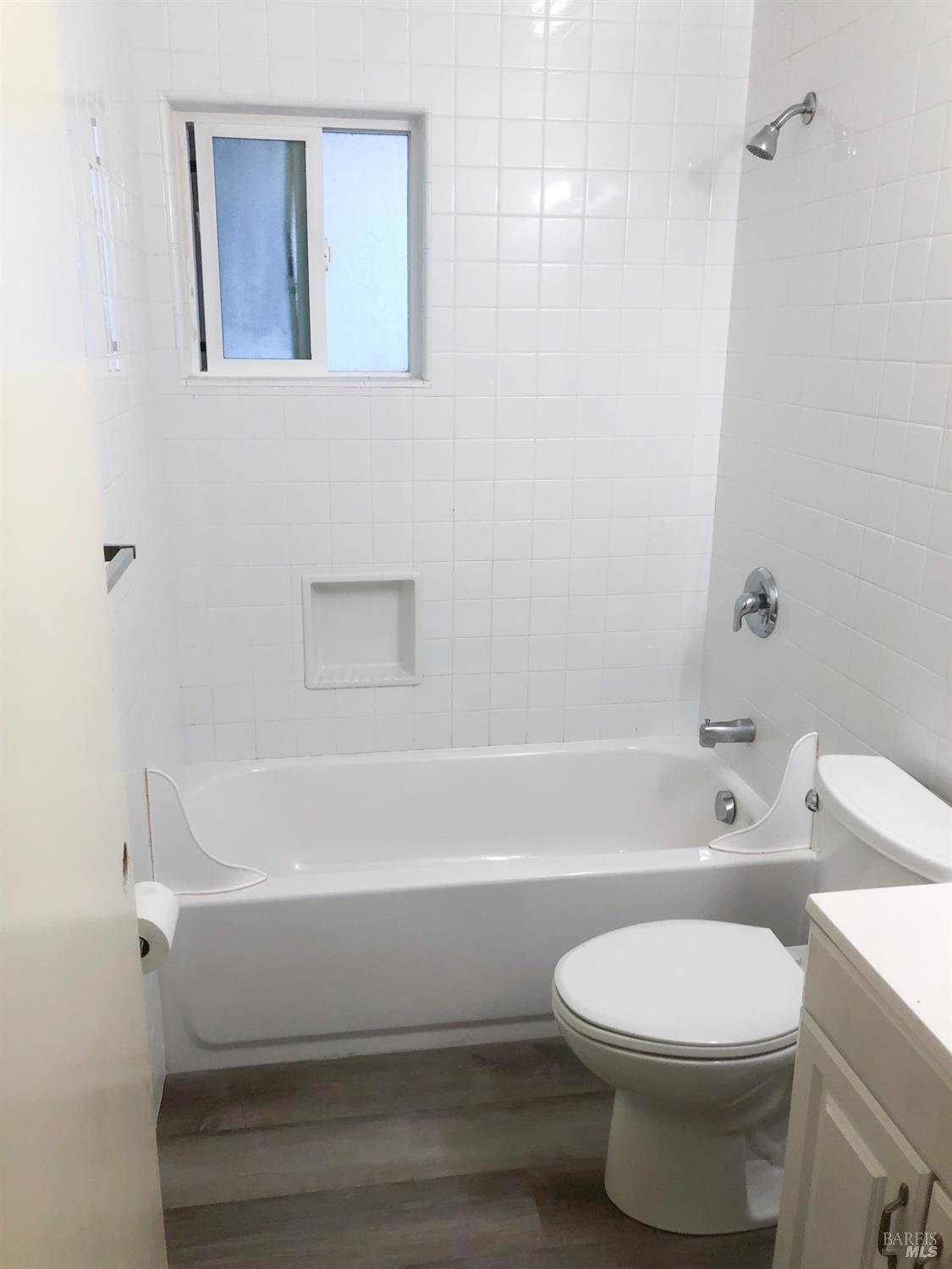 131 Kent Avenue Kentfield, CA 94904 - Photo 21 of 21 a bathroom with a toilet and a bath tub