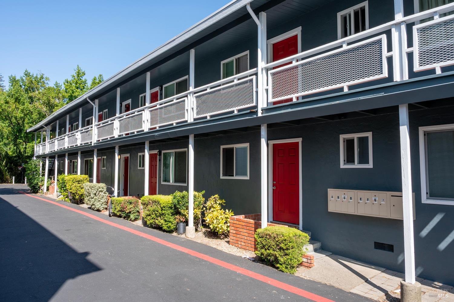 131 Kent Avenue Kentfield, CA 94904 - Photo 3 of 21 a front view of a multi story residential apartment building