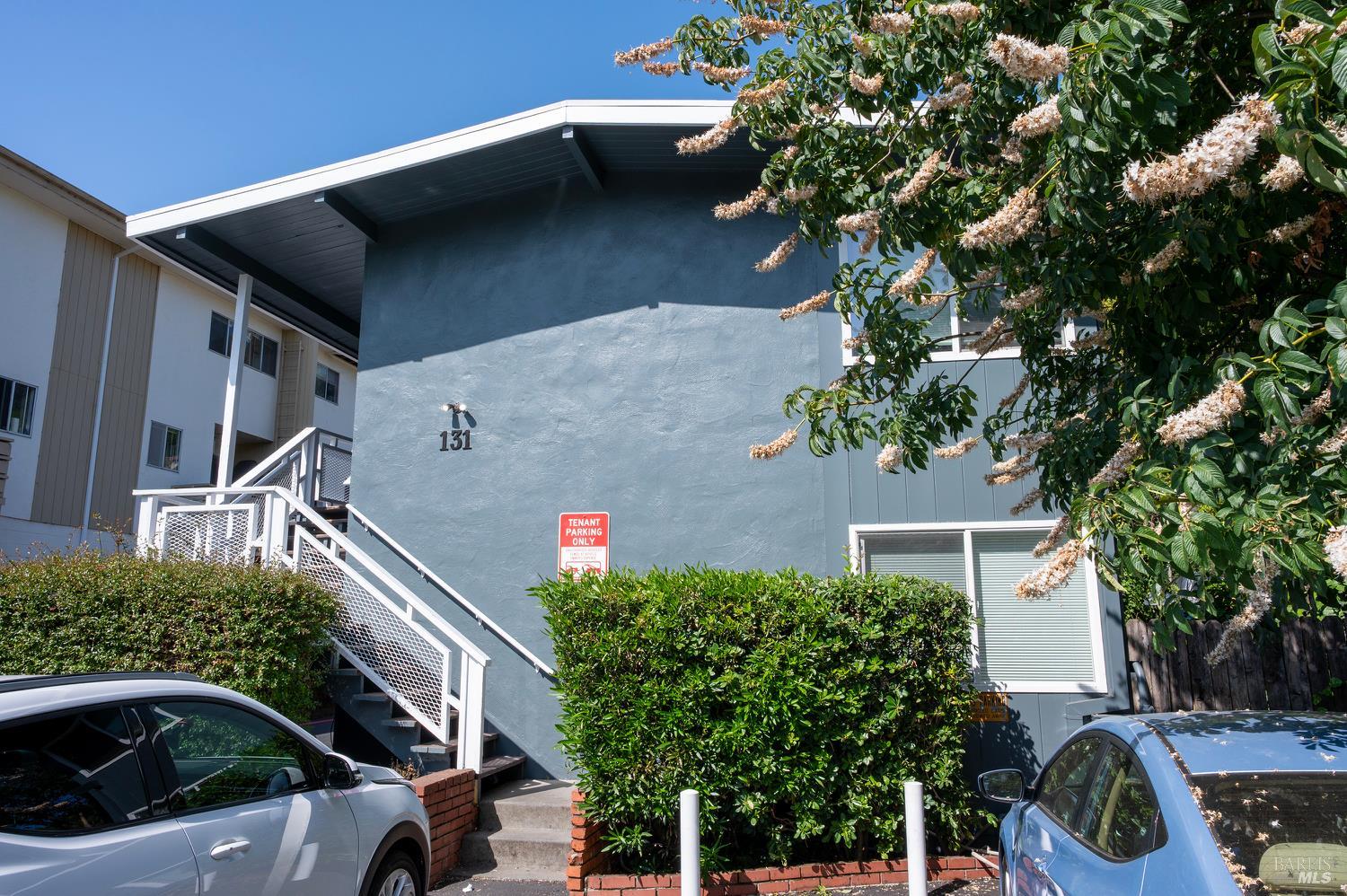 131 Kent Avenue Kentfield, CA 94904 - Photo 10 of 21 a front view of a house with plants