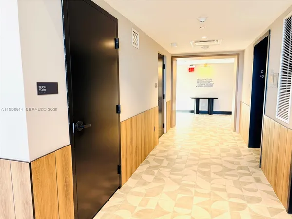 a picture of door with a bench