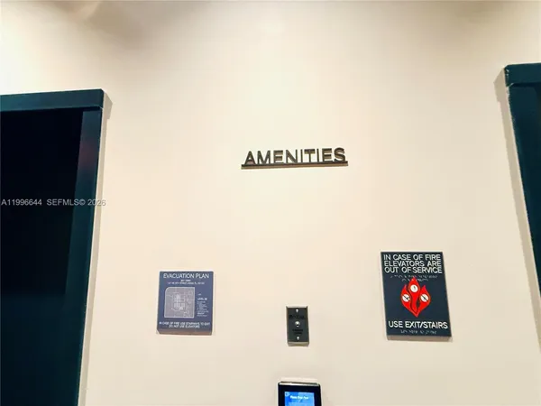 a view of a swimming pool with outdoor seating