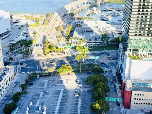 a outdoor space with lots of potted plants and a fountain
