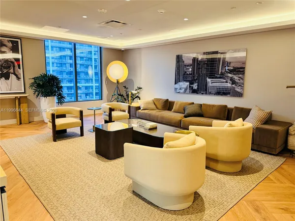 a dining room with table and chairs
