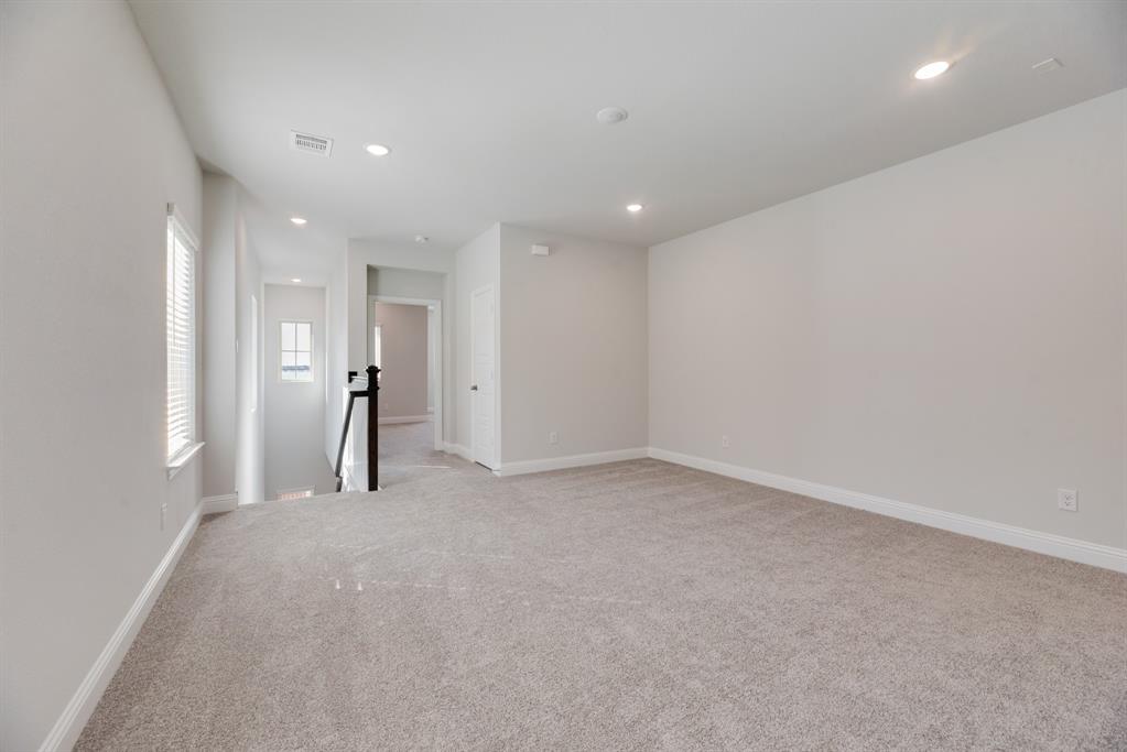 7009 Sunset Boulevard Rowlett, TX 75088 - Photo 18 of 35 a view of empty room