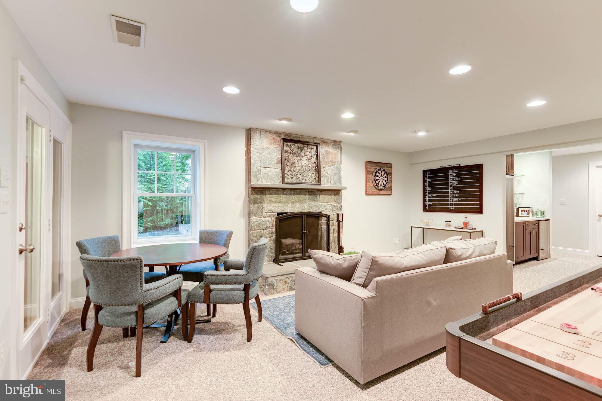 1835 Kirby Road McLean, VA 22101 - Photo 20 of 30 Lower Level Family Room w/ Wood Burning Fireplace