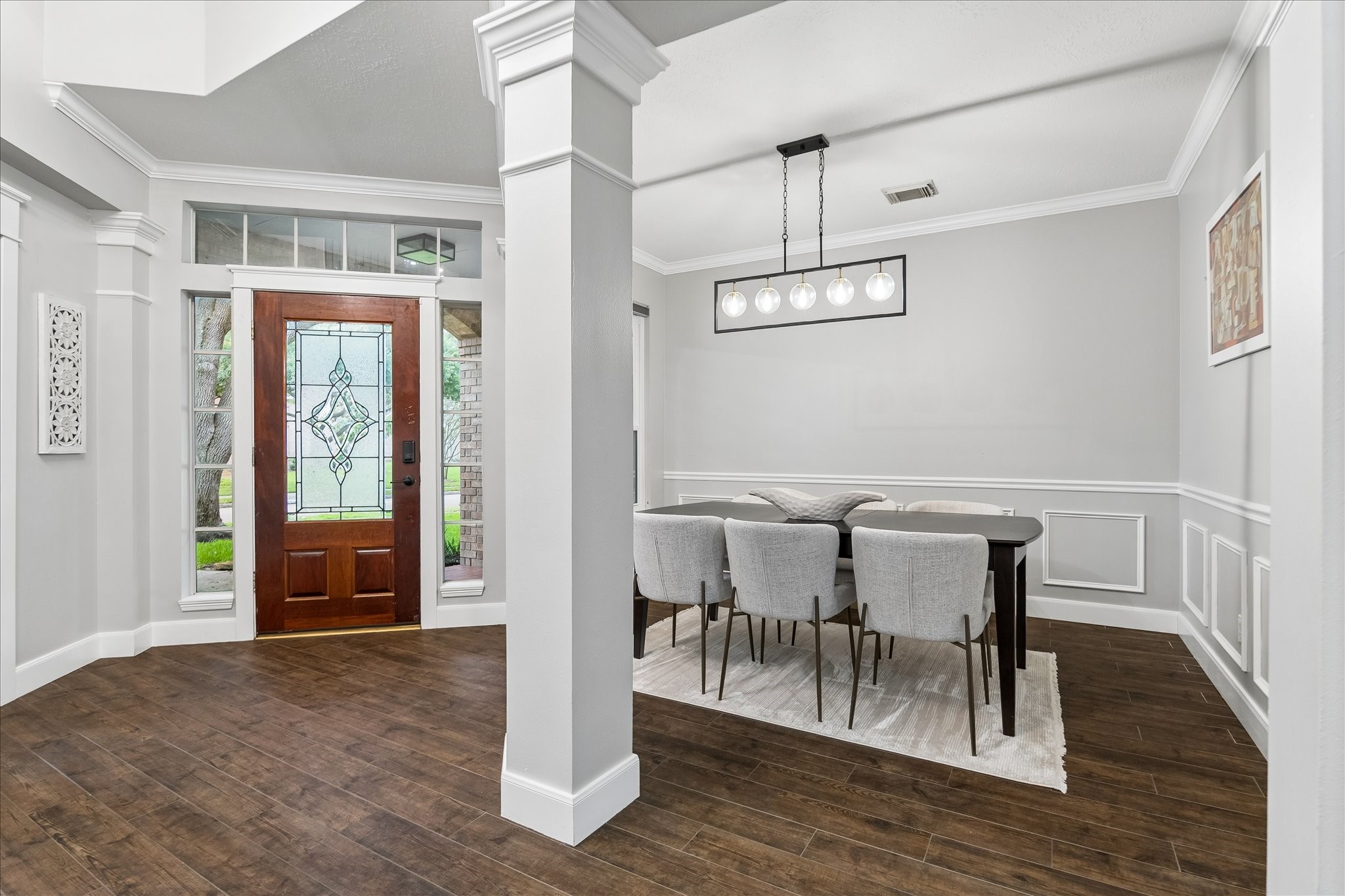 23039 Enchanted Landing Lane Katy, TX 77494 - Photo 7 of 30 a view of a dining room with furniture window and wooden floor