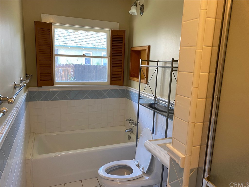491 Eldora Road Pasadena, CA 91104 - Photo 11 of 14 a bathroom with a granite countertop sink toilet and shower