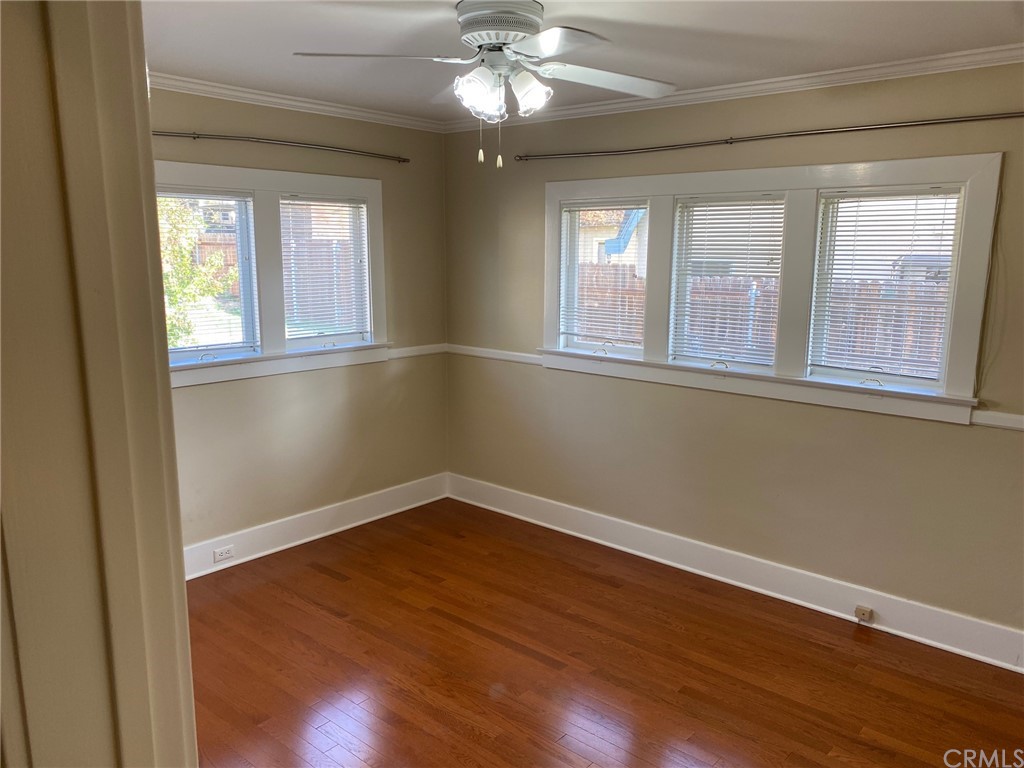 491 Eldora Road Pasadena, CA 91104 - Photo 8 of 14 a view of an empty room with wooden floor and a window