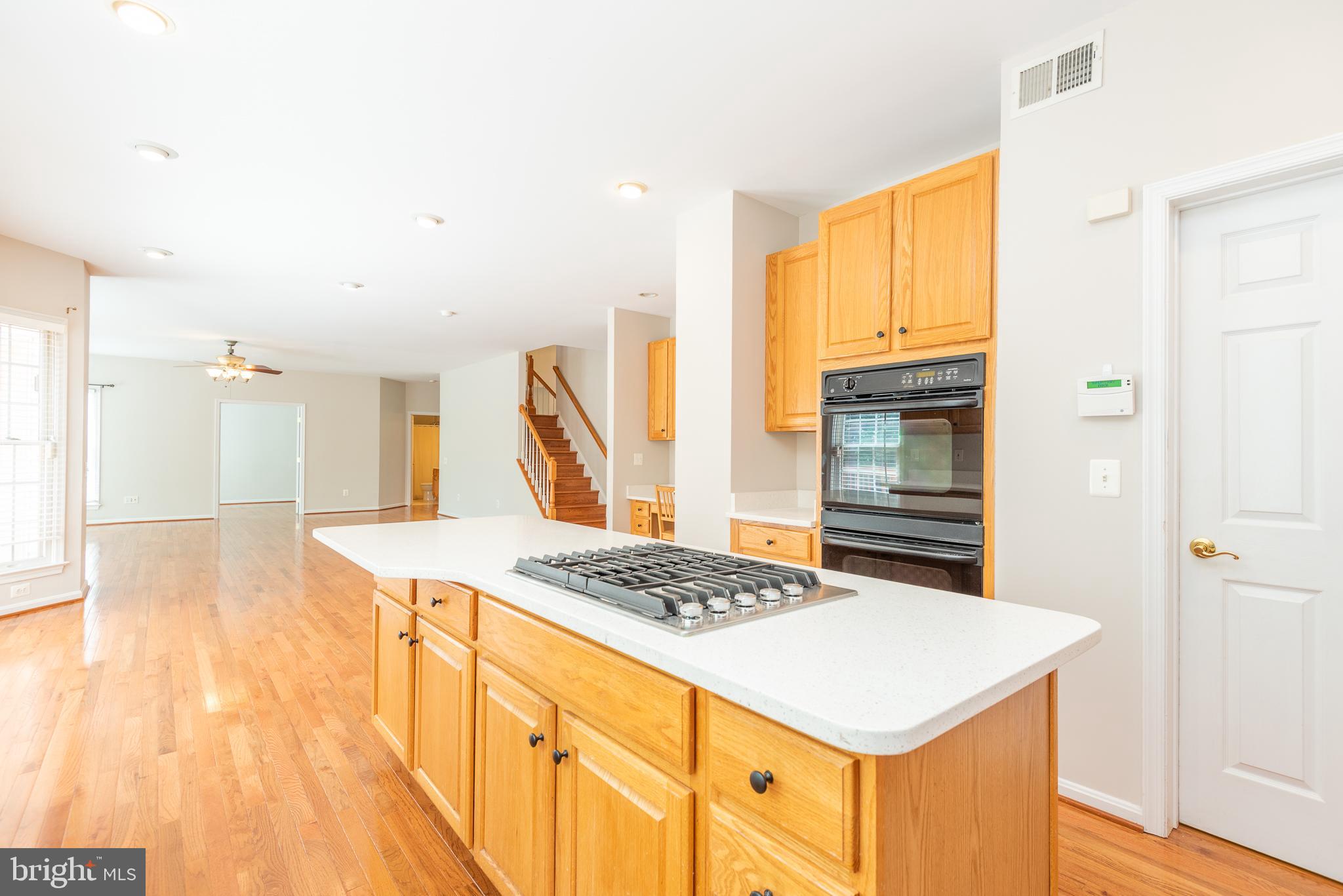 6033 Sumner Road Alexandria, VA 22310 - Photo 13 of 52 New Kitchenaid gas cooktop centers the island