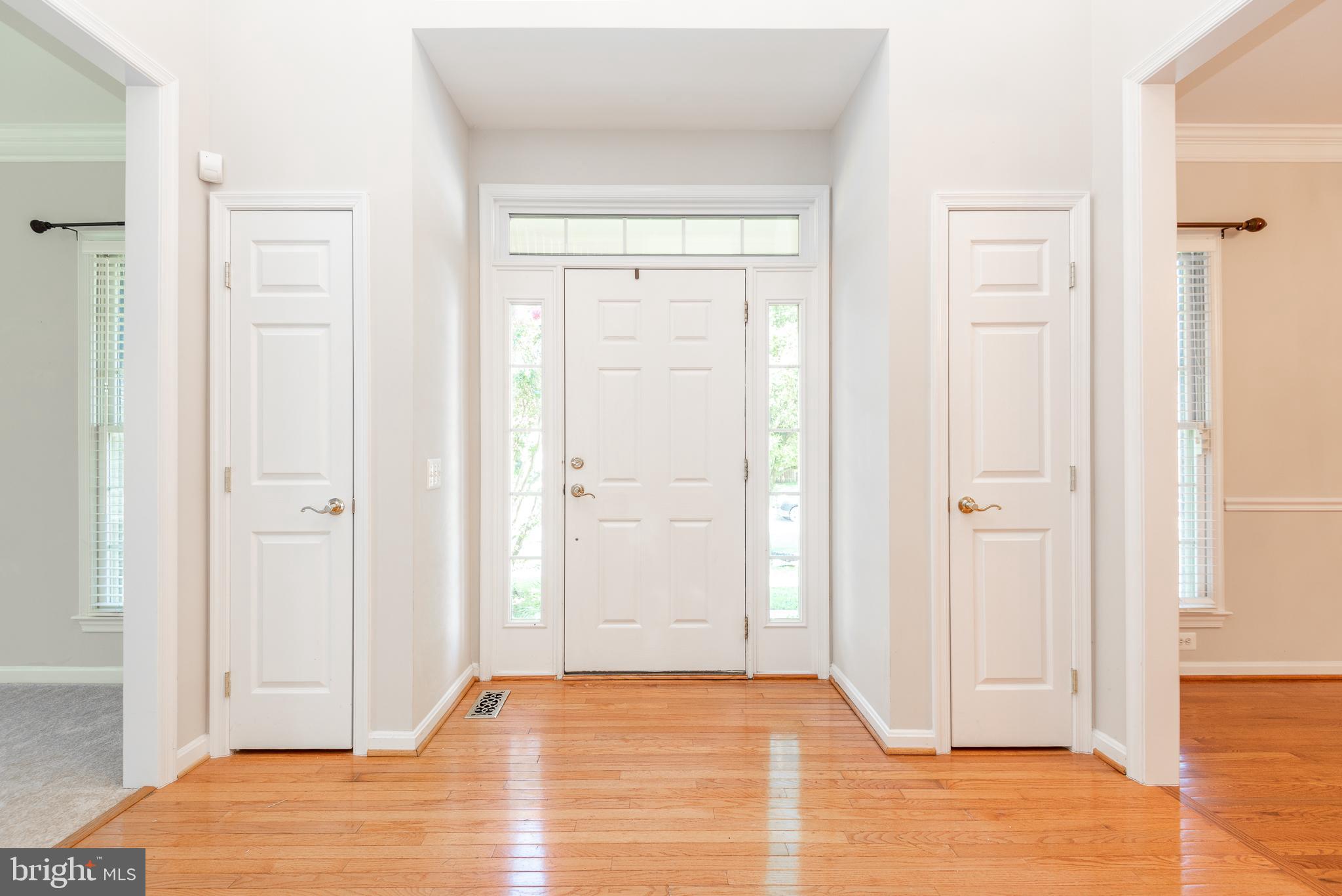 6033 Sumner Road Alexandria, VA 22310 - Photo 3 of 52 Coat closets flank the classic front entrance