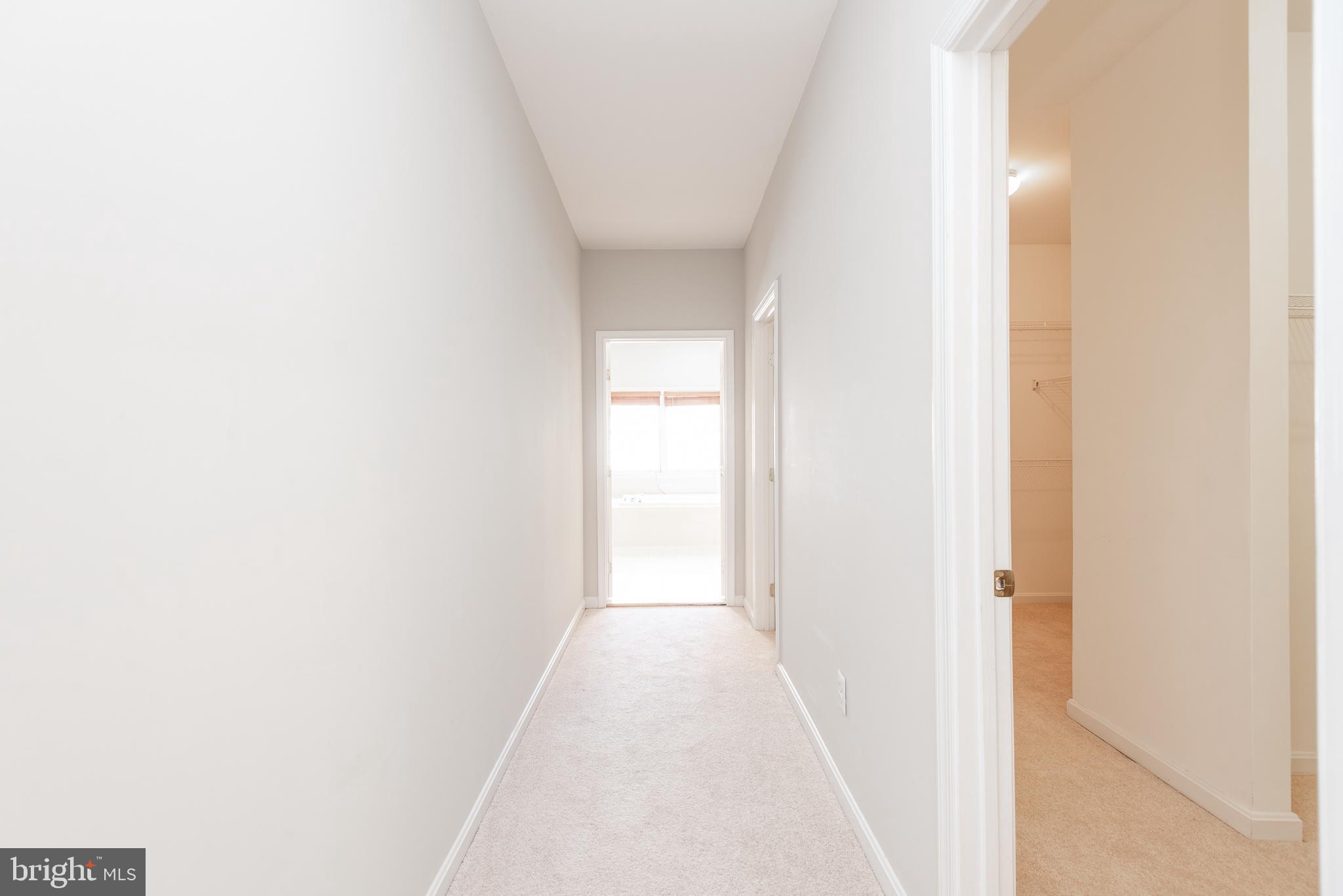 6033 Sumner Road Alexandria, VA 22310 - Photo 23 of 52 Private hallway to closets and primary bathroom