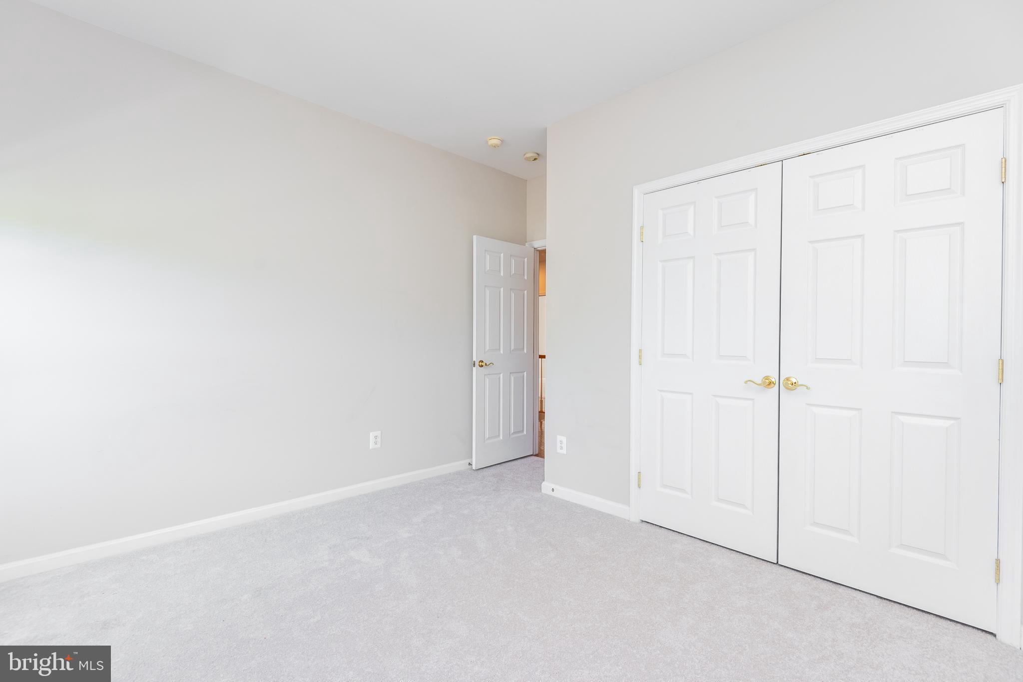 6033 Sumner Road Alexandria, VA 22310 - Photo 29 of 52 Right front bedroom with double-door closet