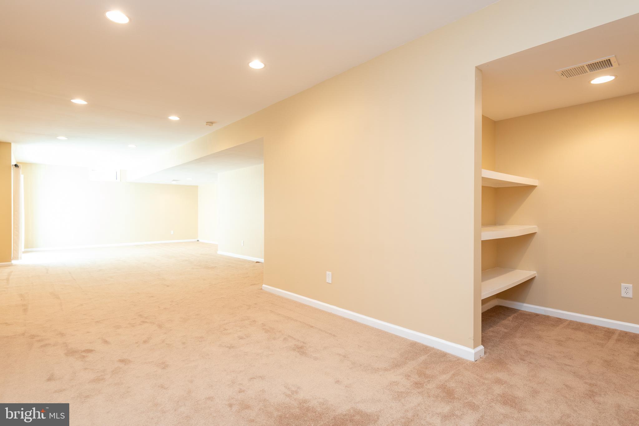 6033 Sumner Road Alexandria, VA 22310 - Photo 43 of 52 Basement with built-in shelving