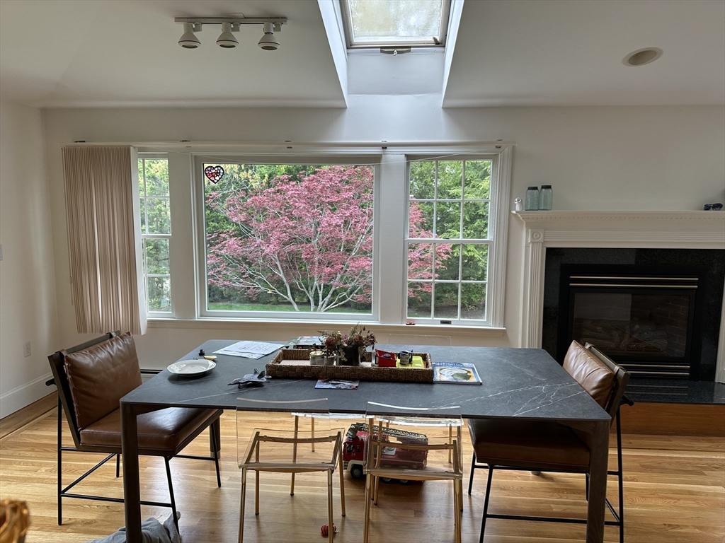 45 Wellesley Road Belmont, MA 02478 - Photo 7 of 42 a view of a dining room with furniture window and outside view