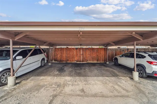 a view of a room with wooden walls