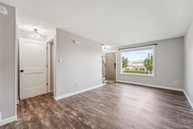 a view of an empty room and window