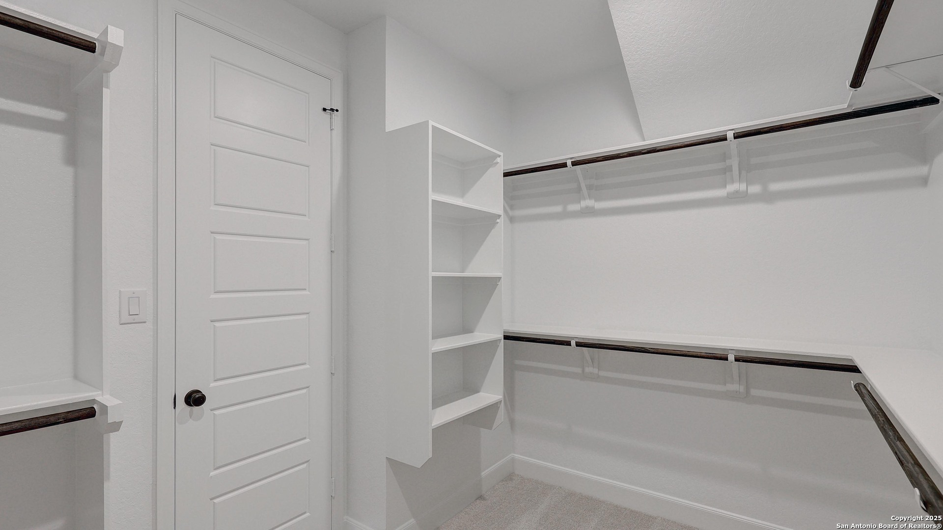 213 Hidalgo Boerne, TX 78006 - Photo 22 of 35 a view of walk in closet