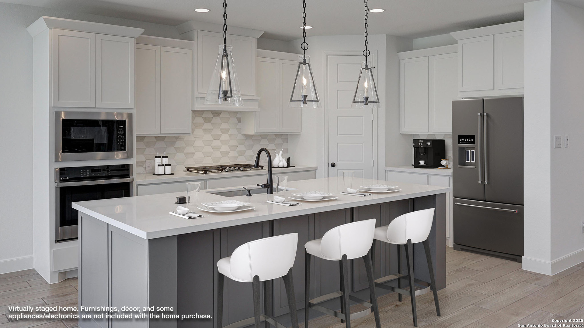 213 Hidalgo Boerne, TX 78006 - Photo 6 of 35 a kitchen with stainless steel appliances kitchen island granite countertop a sink and a refrigerator