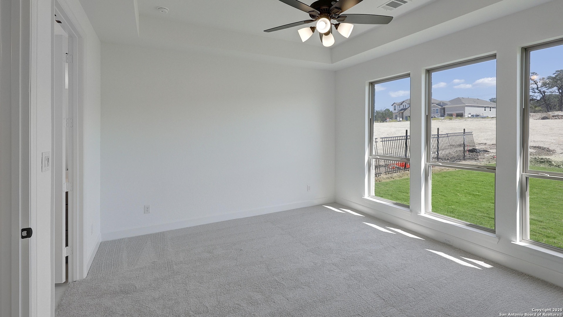 213 Hidalgo Boerne, TX 78006 - Photo 10 of 35 a view of an empty room with a window