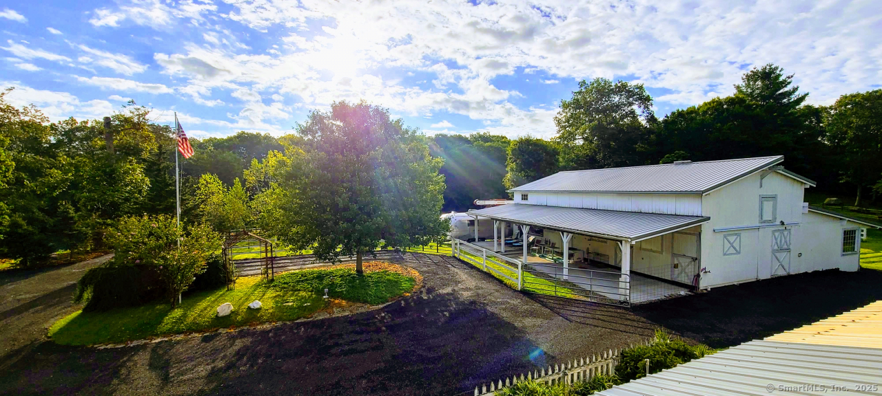 58 Botsford Hill Road Newtown, CT 06470 - Photo 14 of 39 a view of a house with a yard