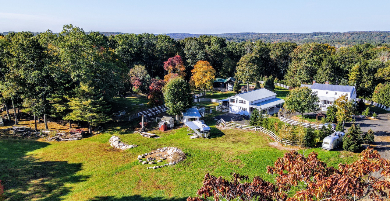 58 Botsford Hill Road Newtown, CT 06470 - Photo 21 of 39 a view of a swimming pool with a garden