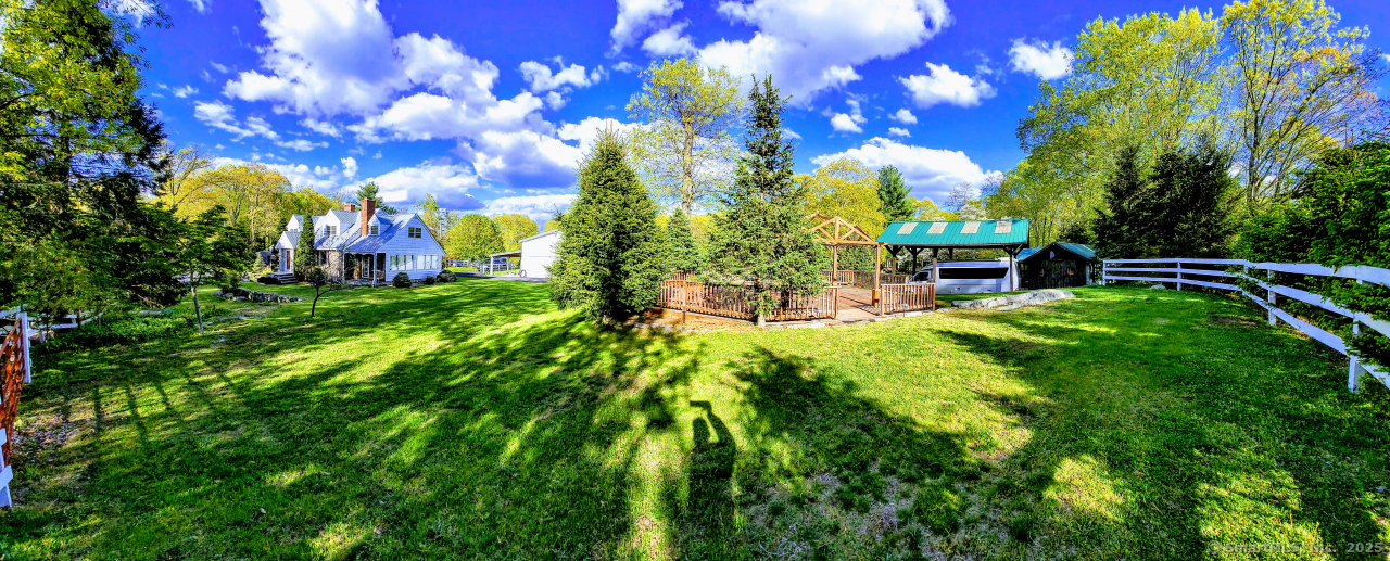 58 Botsford Hill Road Newtown, CT 06470 - Photo 6 of 39 a view of a house with a backyard porch and sitting area