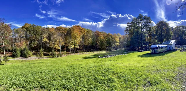 a view of a playground with basketball court
