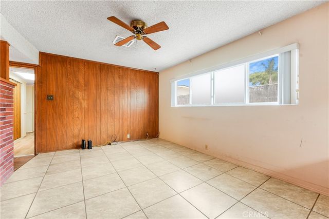 a spacious bathroom with a double vanity sink and a mirror