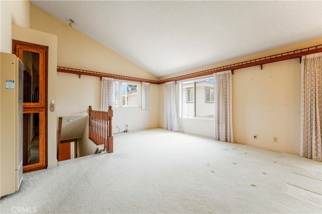 a view of a kitchen with a stove cabinets and wooden floor
