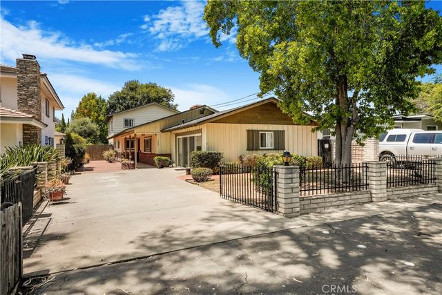 a view of a house with a patio