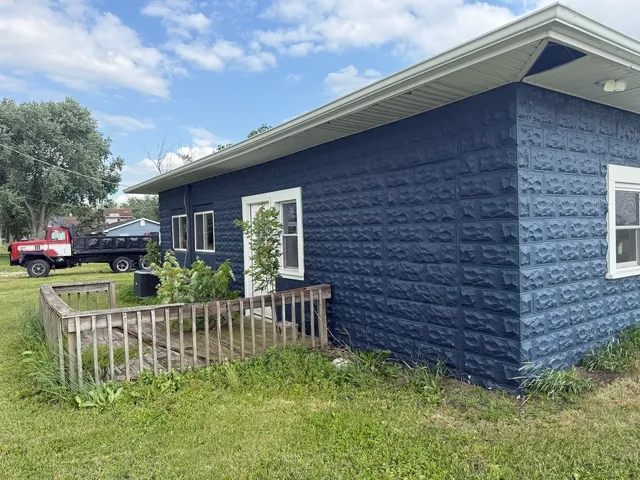 a view of a backyard of the house