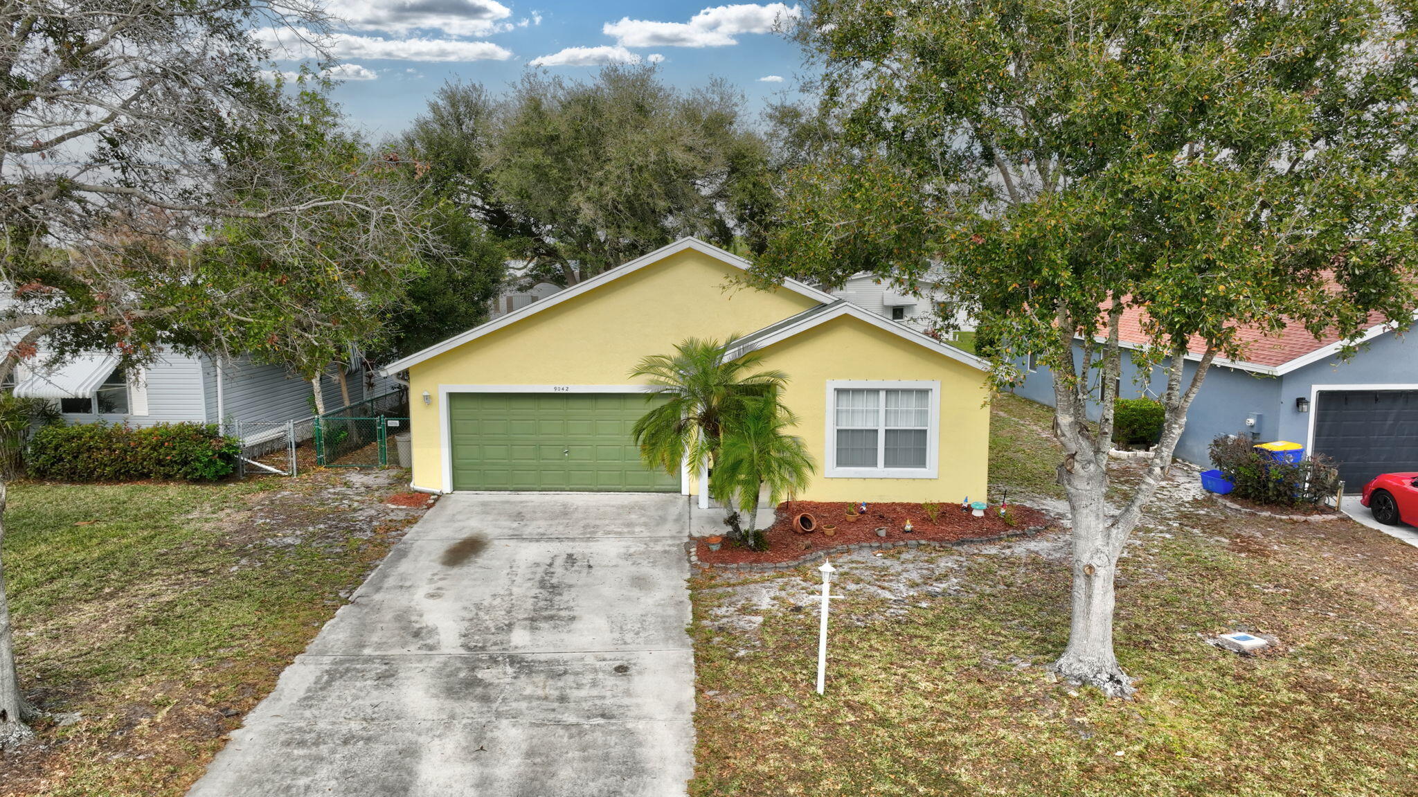 9042 Southwest Caprice Circle Stuart, FL 34997 - Photo 12 of 13 9042-20 Aerial of Front