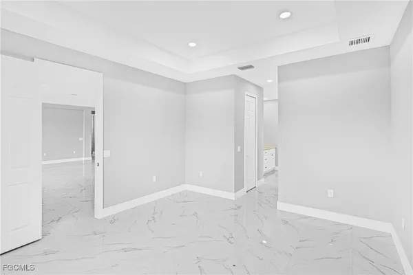 a bathroom with a double vanity sink mirror and